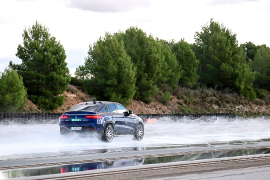 Testing grip on wet asphalt